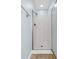 A stand up shower stall in the bathroom with glass door and tile flooring at 11 Glen Valley Ct, Angier, NC 27501