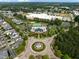 Overhead view of community pool, tennis courts, and surrounding neighborhood, showcasing its prime location at 1109 Renewal Pl, Raleigh, NC 27603