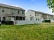 Spacious backyard featuring a white fence and well-maintained lawn, perfect for outdoor activities at 1109 Renewal Pl, Raleigh, NC 27603