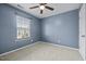 Bedroom with a window and blinds, a ceiling fan, and carpeted floors at 1109 Renewal Pl, Raleigh, NC 27603