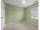 Bedroom with a window and blinds, a ceiling fan, and carpeted floors at 1109 Renewal Pl, Raleigh, NC 27603