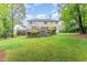 Enjoy this home's expansive backyard and multi-tiered deck at 111 Murdock Creek Ct, Cary, NC 27519