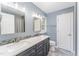 Bathroom boasts double vanity, modern fixtures, and stylish mirror at 111 Murdock Creek Ct, Cary, NC 27519