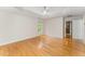 Bedroom with hardwood floors, a ceiling fan and closet at 111 Murdock Creek Ct, Cary, NC 27519