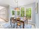 Bright breakfast nook with lots of natural light and a casual dining area at 111 Murdock Creek Ct, Cary, NC 27519