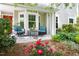 Inviting backyard patio featuring comfortable seating, lush greenery, and a peaceful atmosphere for outdoor enjoyment at 111 Sir Richard Ln, Chapel Hill, NC 27517