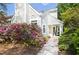 Inviting home featuring well-manicured landscaping and a welcoming entryway at 111 Sir Richard Ln, Chapel Hill, NC 27517