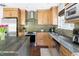 Close-up of a kitchen with stainless steel appliances and tile backsplash at 111 Sir Richard Ln, Chapel Hill, NC 27517