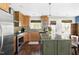 Well-appointed kitchen featuring stainless steel appliances and a center island at 111 Sir Richard Ln, Chapel Hill, NC 27517