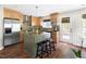Stylish kitchen boasting stainless steel appliances and a functional center island at 111 Sir Richard Ln, Chapel Hill, NC 27517