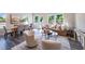 Open living spaces showcasing a dining room, living room, chairs, and natural light at 1114 Merlot Hills Ln, Durham, NC 27704