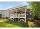 This covered back deck provides outdoor space with nice landscaping and new patio at 11808 Venture Oak Way, Raleigh, NC 27613
