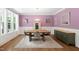 Charming dining room with modern table, decor, and hardwood flooring at 11808 Venture Oak Way, Raleigh, NC 27613