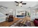 Spacious living area seamlessly connected to the kitchen, ideal for entertaining at 11808 Venture Oak Way, Raleigh, NC 27613