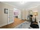 Bright office space with hardwood floors, natural light, and modern furnishings at 11808 Venture Oak Way, Raleigh, NC 27613