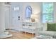 Stylish living room featuring a decorative table, front door, and comfortable sectional sofa at 1203 Queensbury Cir, Durham, NC 27713