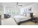 Well-lit main bedroom features a sitting area and a large window at 1203 Queensbury Cir, Durham, NC 27713