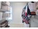 Organized walk-in closet with built-in shelving and ample storage space at 1203 Queensbury Cir, Durham, NC 27713