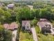 An aerial view of the home with landscaped yard and beautiful neighborhood at 1209 Kingston Ridge Rd, Cary, NC 27511