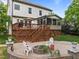 Beautiful backyard with a deck and a fire pit, perfect for entertaining at 1209 Kingston Ridge Rd, Cary, NC 27511