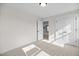 Bedroom with neutral carpet, closet, and lots of natural light at 1236 Cricket St, Elon, NC 27244