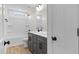 Bathroom features double sink, tub and shower at 1302 Cricket St, Elon, NC 27244