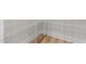 Walk-in closet with custom shelving and wood floors at 1302 Cricket St, Elon, NC 27244