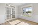 Bright office space with natural light and classic paneling at 1302 Cricket St, Elon, NC 27244