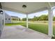 Covered outdoor patio space is ideal for entertaining and relaxing at 1302 Cricket St, Elon, NC 27244