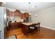 Beautiful kitchen island with bar seating and stainless steel appliances at 1305 Chronicle Dr, Durham, NC 27703