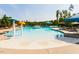 Community pool area with splash-pad mushroom water feature and several lounge chairs at 132 Deardom Way, Chapel Hill, NC 27516