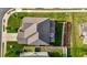 An aerial view shows a home with a neatly maintained lawn and a fenced backyard patio area at 1320 Abington Dr, Mebane, NC 27302