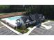 Aerial view of the community building, pool, parking and landscaping at 1320 Abington Dr, Mebane, NC 27302