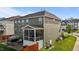 Large backyard featuring a patio, hot tub, screened-in porch and green space at 1320 Abington Dr, Mebane, NC 27302