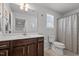Bathroom with single sink vanity and tile flooring at 1320 Abington Dr, Mebane, NC 27302