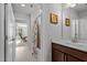 Bathroom with dark wood vanity with white countertop at 1320 Abington Dr, Mebane, NC 27302