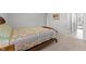 Bedroom with a wooden bed frame and carpet at 1320 Abington Dr, Mebane, NC 27302
