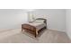 Cozy bedroom with carpet and a wooden bed frame at 1320 Abington Dr, Mebane, NC 27302