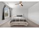 Bright bedroom with a window, a ceiling fan, and carpet at 1320 Abington Dr, Mebane, NC 27302
