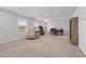 Spacious bonus room with sitting area and desk at 1320 Abington Dr, Mebane, NC 27302