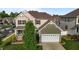 Inviting two-story home with covered front porch and attached garage at 1320 Abington Dr, Mebane, NC 27302