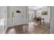 Welcoming foyer with beautiful wood floors, natural light, and an adjacent dining area at 1320 Abington Dr, Mebane, NC 27302