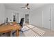 Bright home office features a ceiling fan and lots of natural light at 1320 Abington Dr, Mebane, NC 27302