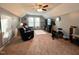 Spacious living room with comfortable seating, entertainment center, and natural light at 1320 Double Oak Ln, Willow Springs, NC 27592
