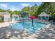 Community pool featuring a splash pad and other water features for Gathering fun in the sun at 136 River Pearl St, Raleigh, NC 27603