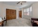 Bedroom featuring neutral carpet, a ceiling fan, a sitting area and an oversized closet at 1415 Meadow Wind Ln, Hillsborough, NC 27278