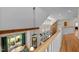 Open floor plan with exposed wood beams and updated windows providing ample natural light at 1415 Meadow Wind Ln, Hillsborough, NC 27278