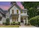 Beautiful two-story home showcasing modern architecture, a welcoming entrance, and lovely curb appeal at 1422 Banbury Rd, Raleigh, NC 27607