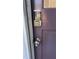 Enhanced security with a smart lock installed on a newly painted door, providing keyless access and peace of mind at 1436 Sedwick Rd, Durham, NC 27713