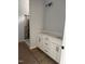 Bathroom featuring dual vanity with white cabinets and marble countertop, as well as a framed shower at 200 Green Pines Estates Dr, Kenly, NC 27542